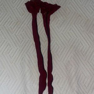 Burgundy red fishnet stockings
